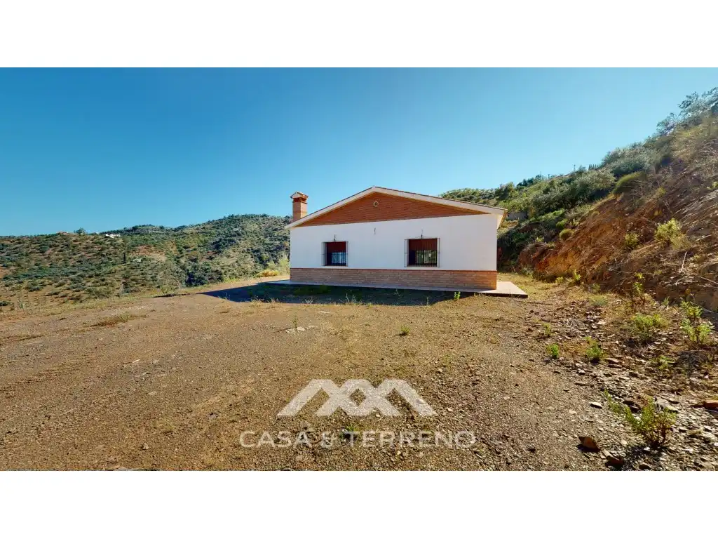 Vista exterior de Casa o xalet en venda en Colmenar amb Aire condicionat