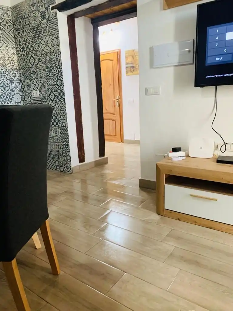 Sala d'estar de Casa adosada en venda en Guía de Isora amb Jardí privat i Terrassa