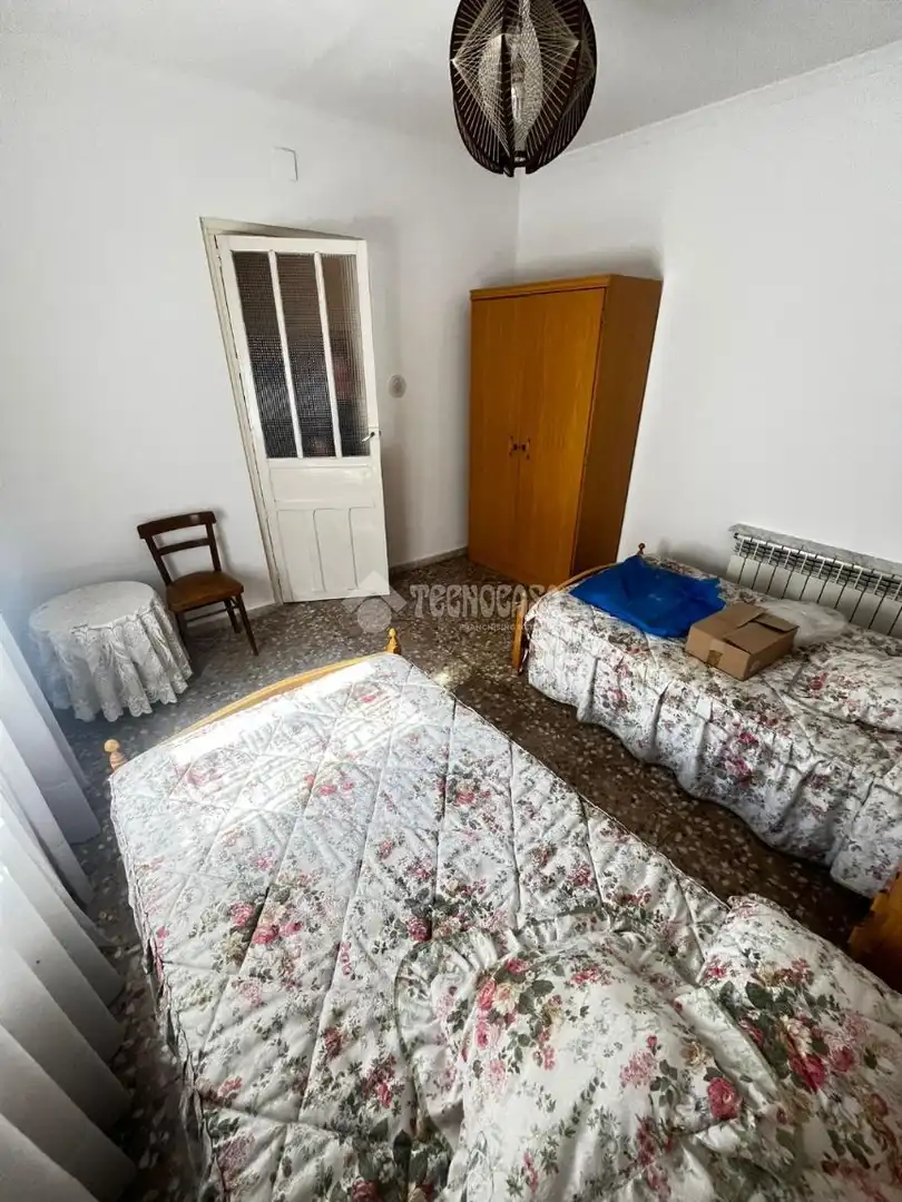 Habitación de Casa adosada en venta en Puertollano con Calefacción