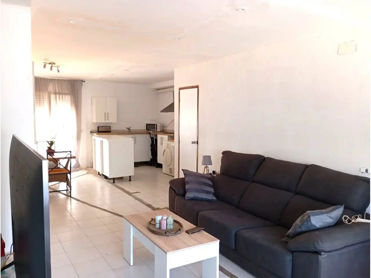 Sala d'estar de Casa o xalet en venda en Cunit amb Calefacció, Jardí privat i Terrassa