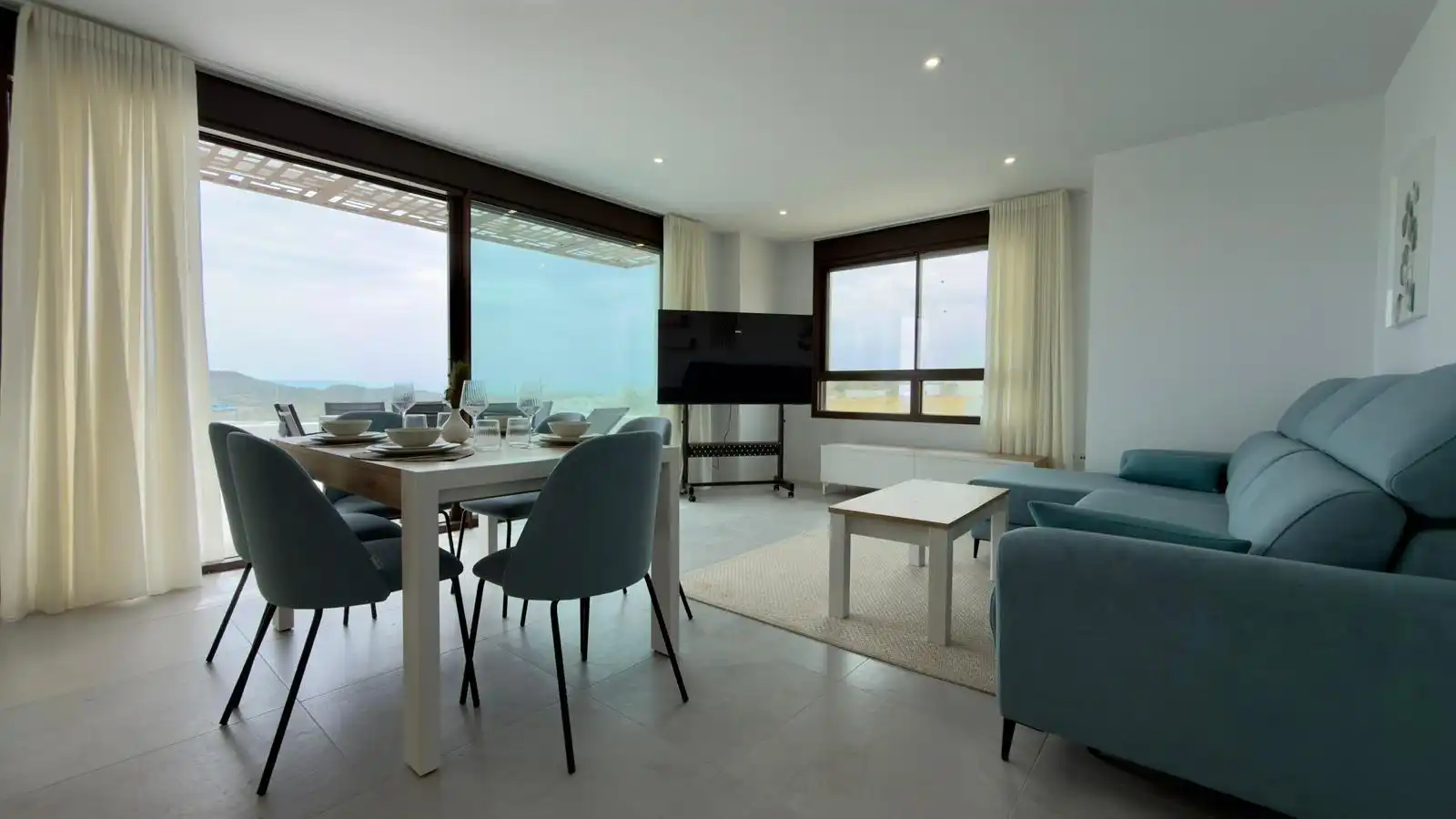 Sala d'estar de Apartament de lloguer en Finestrat amb Aire condicionat, Jardí privat i Terrassa