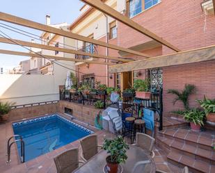 Swimming pool of House or chalet for sale in  Granada Capital  with Air Conditioner, Heating and Parquet flooring