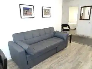 Sala de estar de Piso de alquiler en Gijón  con Calefacción, Parquet y Amueblado