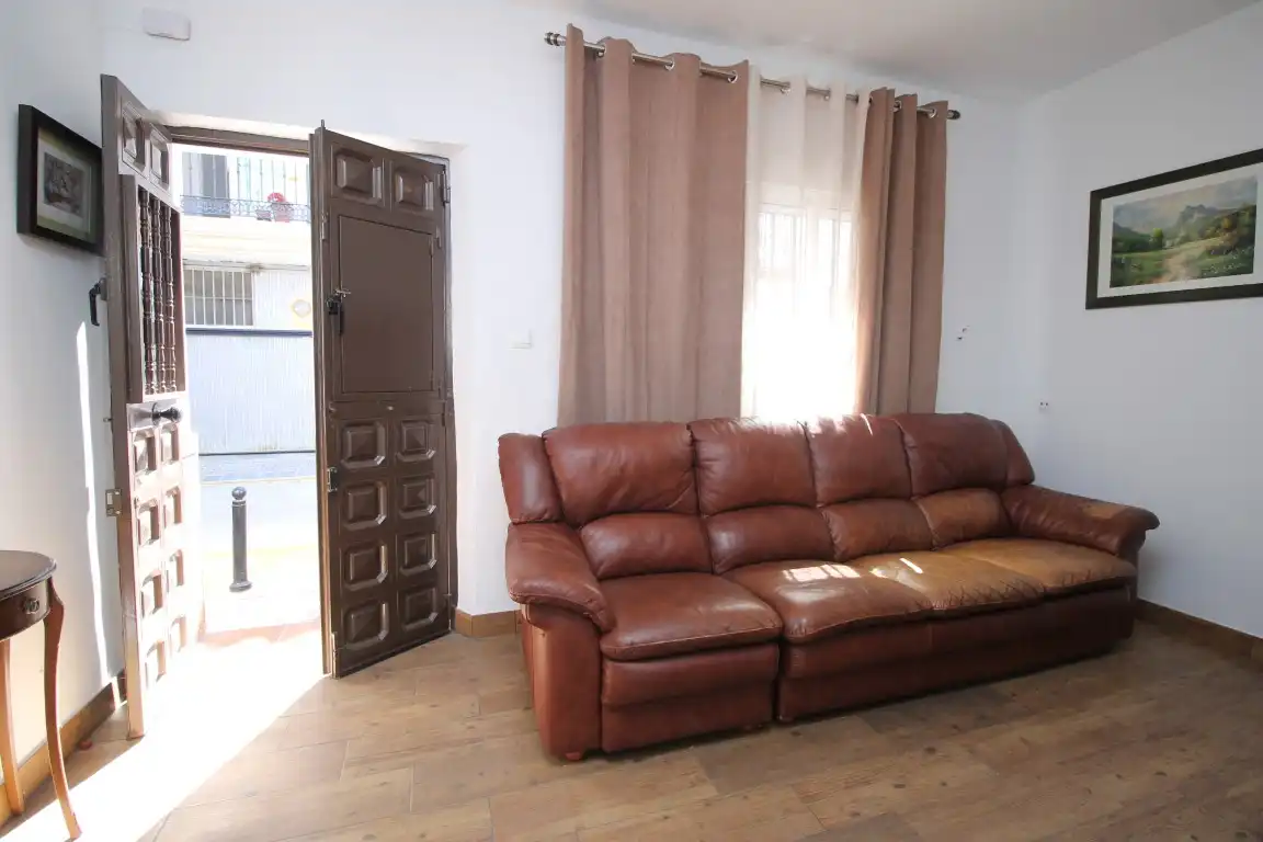 Sala d'estar de Casa adosada en venda en Vélez-Málaga amb Aire condicionat, Calefacció i Terrassa