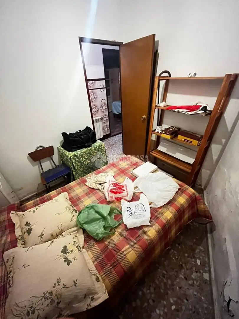 Habitación de Casa adosada en venta en Puertollano con Calefacción