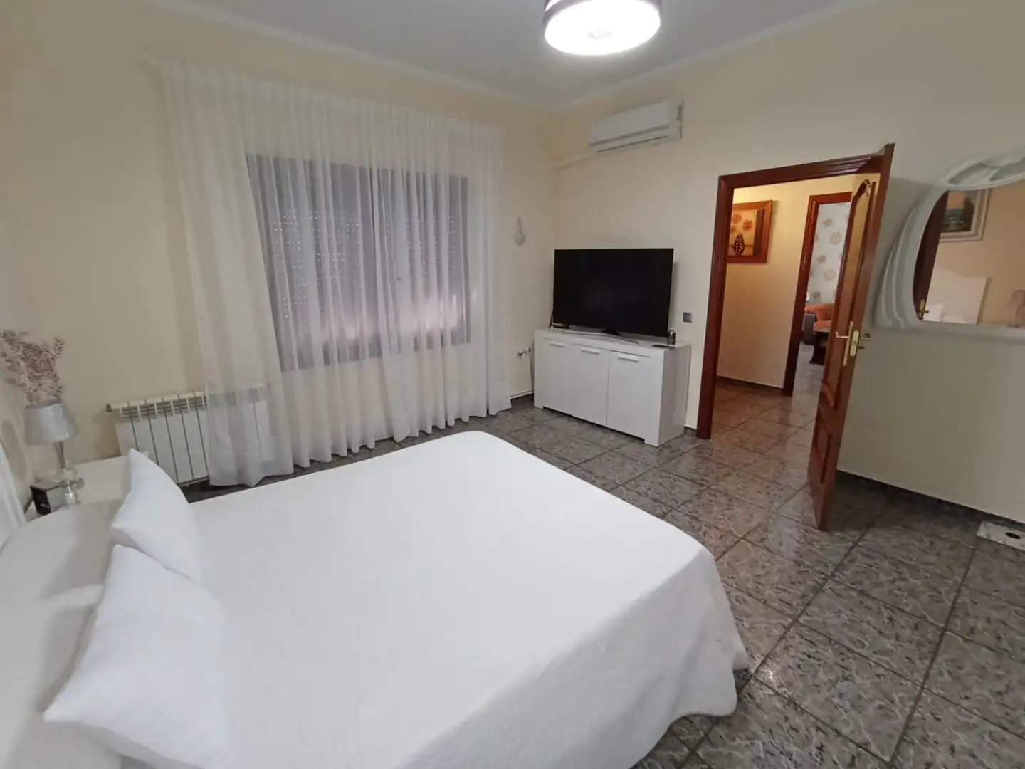 Dormitori de Casa o xalet en venda en Tomelloso amb Aire condicionat, Calefacció i Jardí privat