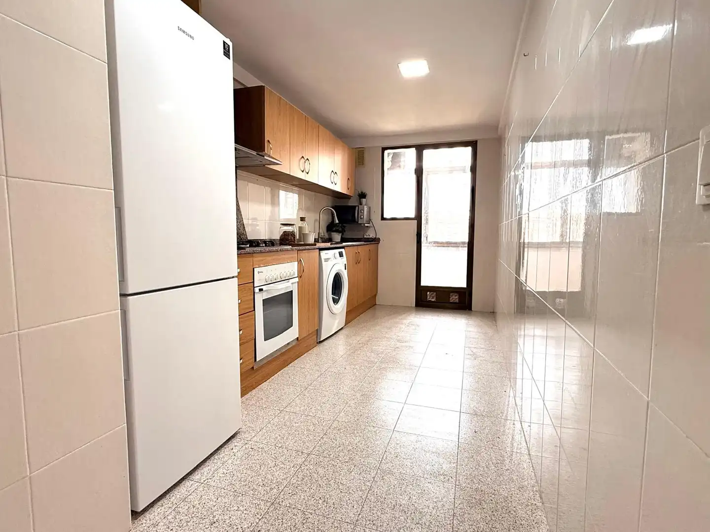 Kitchen of Flat for rent in Torrent  with Oven, Washing machine and Microwave