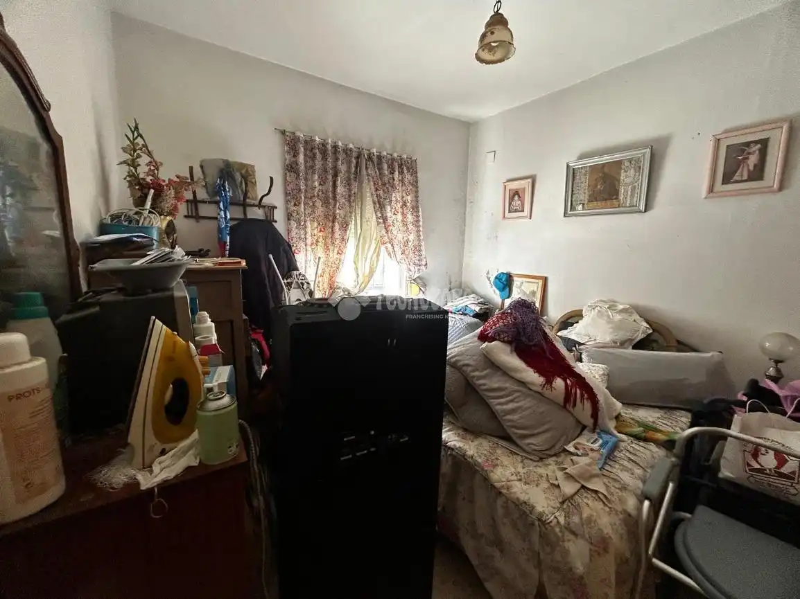 Schlafzimmer von Einfamilien-Reihenhaus zum Verkauf in La Rinconada mit Klimaanlage und Heizung