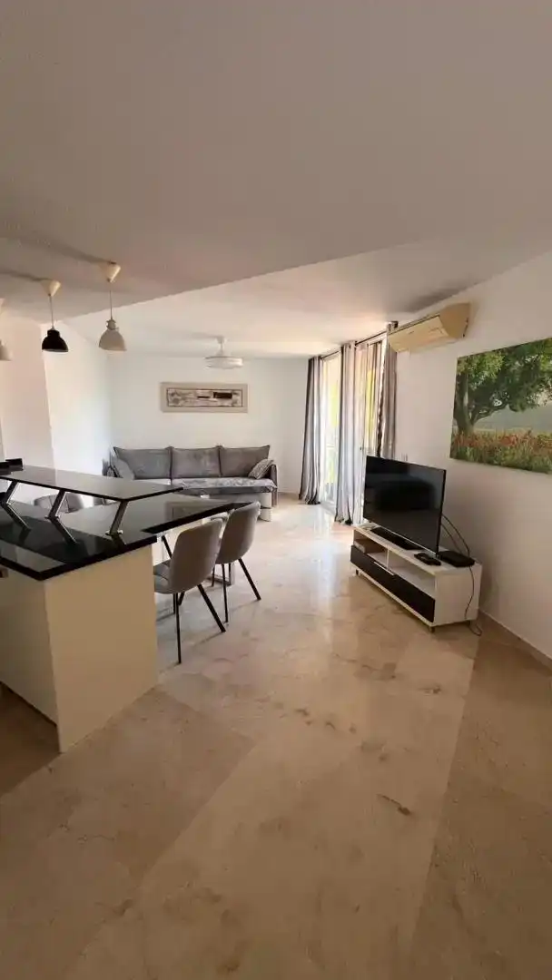 Sala de estar de Dúplex de alquiler en Calpe / Calp con Aire acondicionado, Jardín privado y Parquet