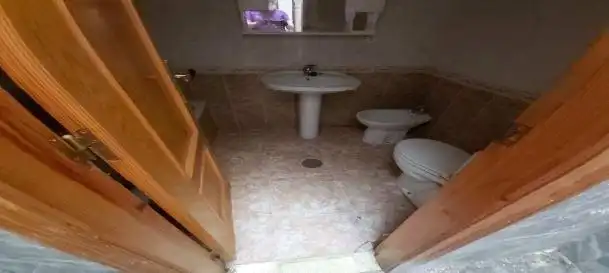 Bany de Casa adosada en venda en Guadix