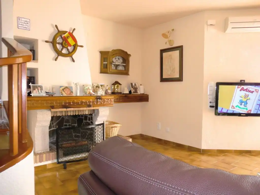 Sala d'estar de Casa adosada en venda en El Puig de Santa Maria amb Aire condicionat, Calefacció i Jardí privat