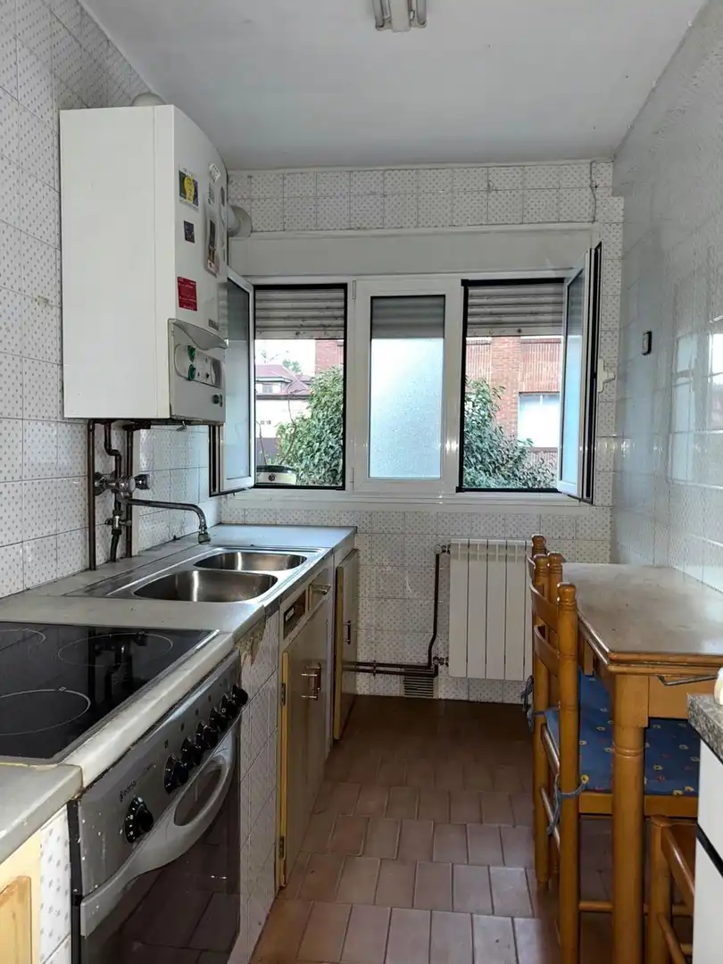 Kitchen of Flat for sale in Oviedo   with Heating and Swimming Pool