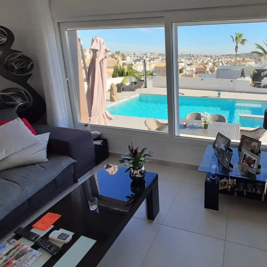 Sala d'estar de Casa o xalet en venda en Rojales amb Aire condicionat, Jardí privat i Terrassa