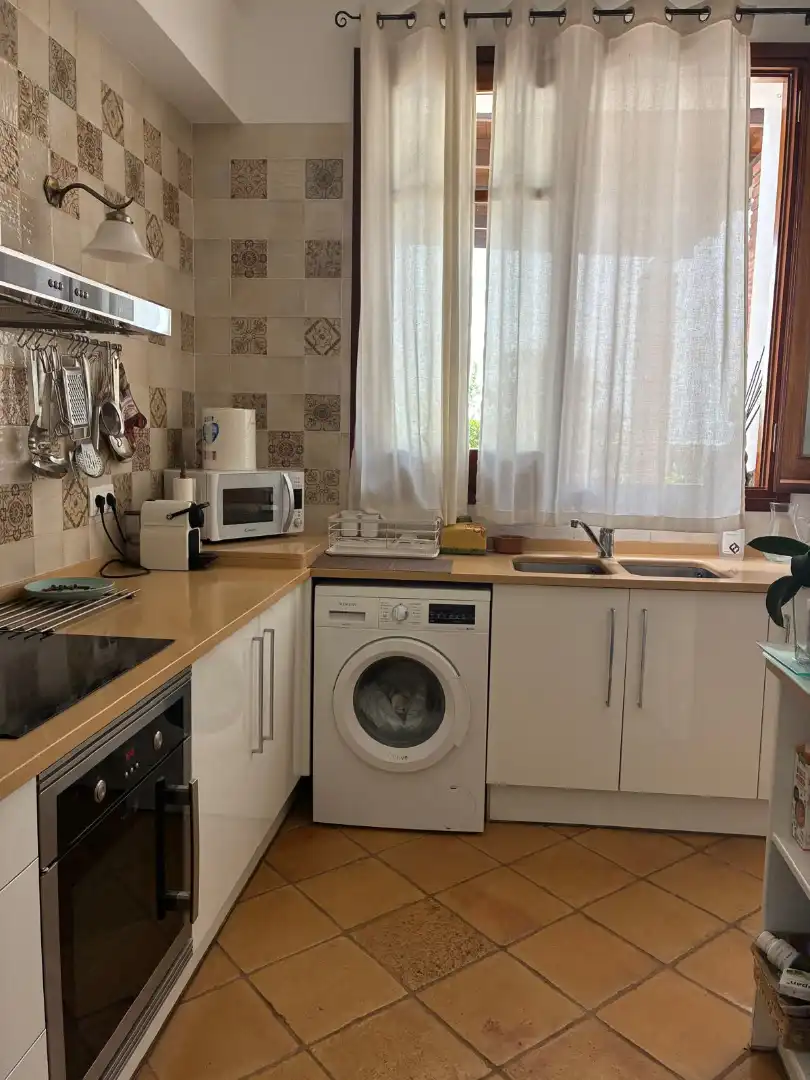 Cuina de Casa adosada en venda en Canet de Mar amb Aire condicionat, Terrassa i Forn