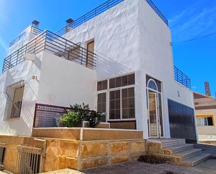 Exterior view of House or chalet for sale in  Almería Capital  with Air Conditioner, Terrace and Swimming Pool