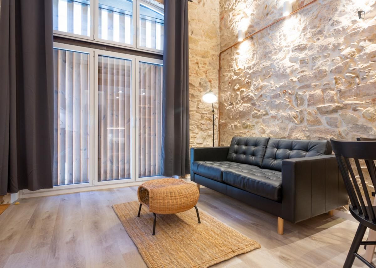 Sala d'estar de Apartament de lloguer en  Barcelona Capital amb Aire condicionat, Calefacció i Moblat