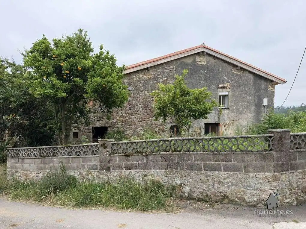 Vista exterior de Casa adosada en venda en Villaviciosa amb Jardí privat