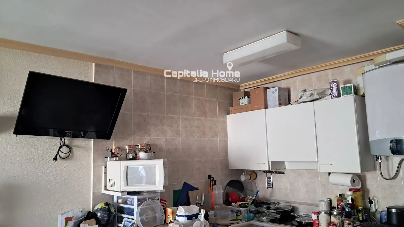 Küche von Wohnung zum Verkauf in Sant Josep de sa Talaia mit Klimaanlage, Heizung und Schwimmbad