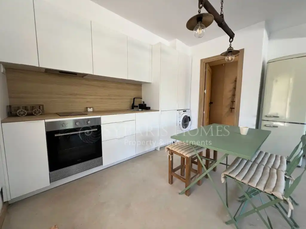 Küche von Wohnung zum Verkauf in Dénia mit Klimaanlage, Privatgarten und Terrasse