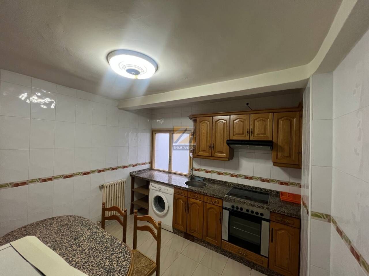 Kitchen of Flat for sale in Oviedo   with Heating, Parquet flooring and Furnished