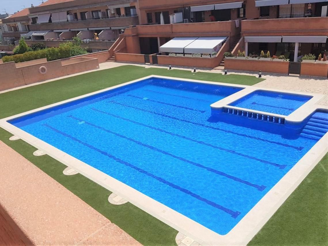 Swimming pool of Attic for sale in Cubelles  with Air Conditioner, Heating and Private garden