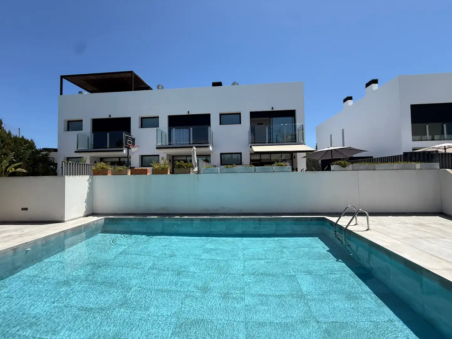 Swimming pool of Houses for sale in Santa Eulària des Riu  with Air Conditioner, Heating and Terrace