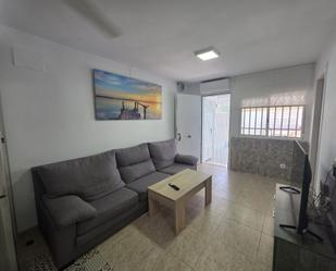 Sala d'estar de Casa o xalet de lloguer en Santa Pola amb Aire condicionat, Terrassa i Moblat