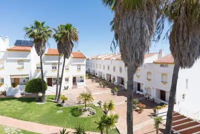Vista exterior de Casa adosada en venta en Benalmádena con Aire acondicionado, Calefacción y Jardín privado
