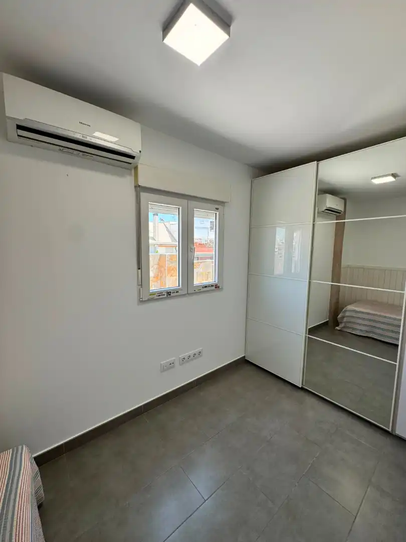 Habitación de Ático de alquiler en Valencia con Aire acondicionado, Terraza y Amueblado