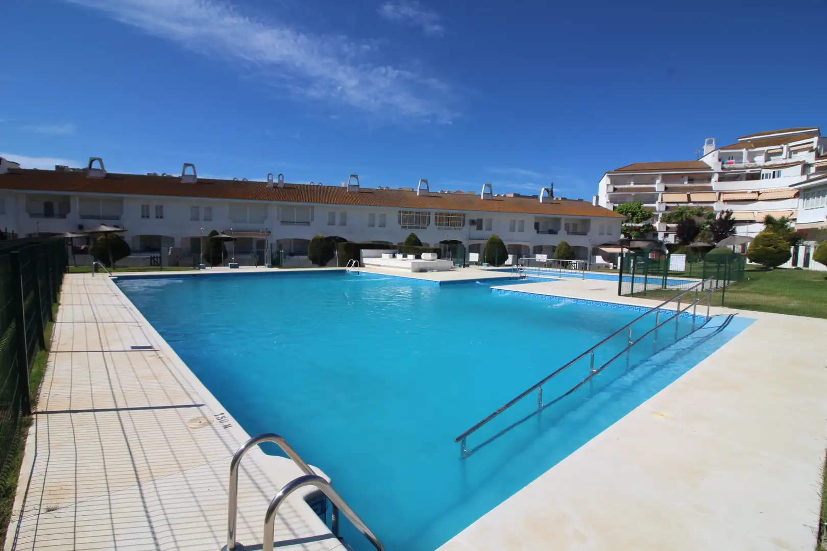 Swimming pool of Detached homes for sale in El Portil  with Terrace, Storage room and Community pool