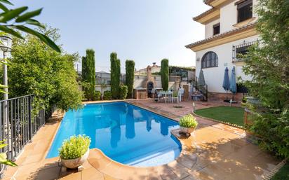 Swimming pool of House or chalet for sale in Monachil  with Air Conditioner, Heating and Private garden