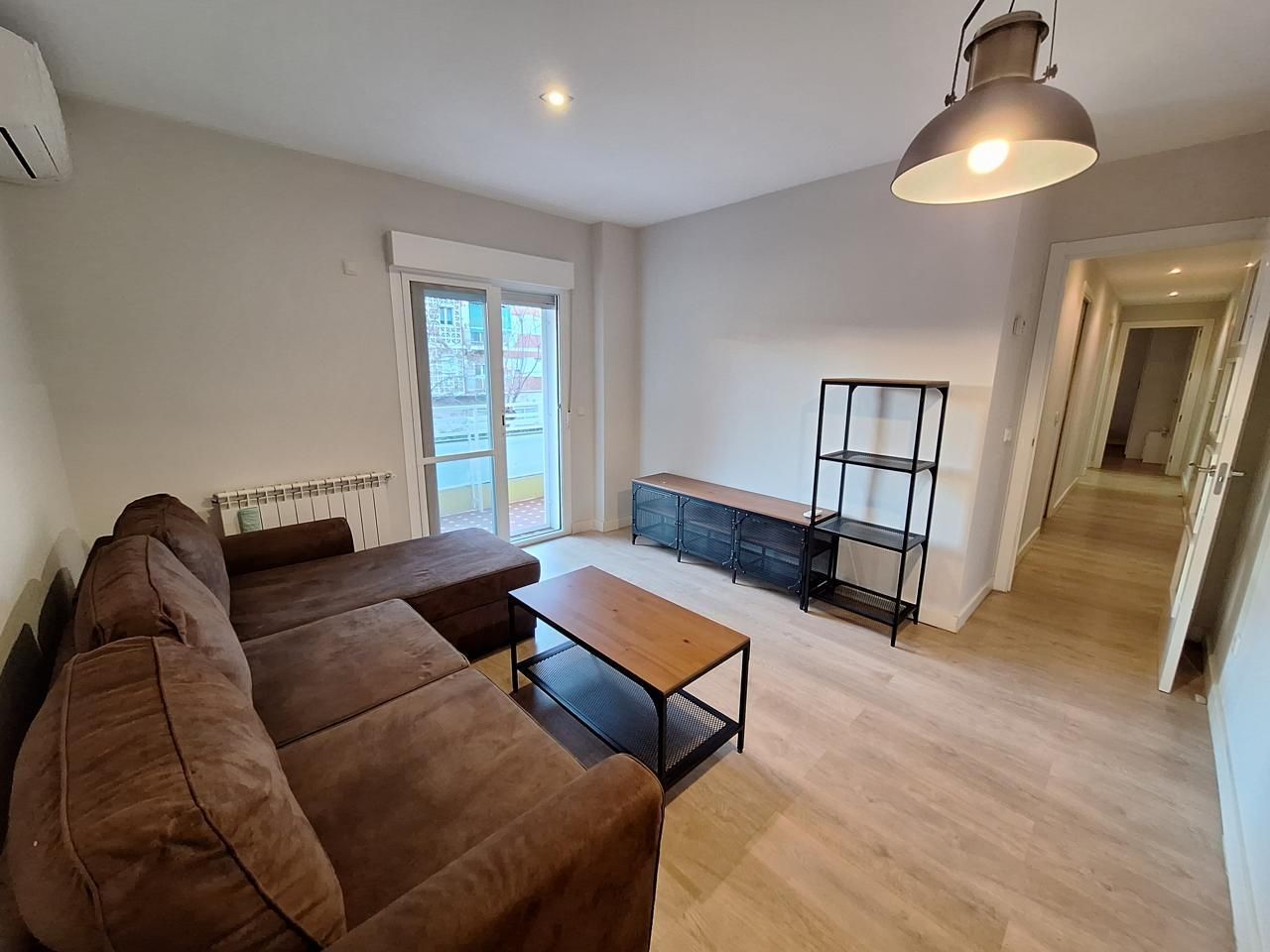 Living room of Flat to rent in  Madrid Capital  with Air Conditioner, Heating and Terrace