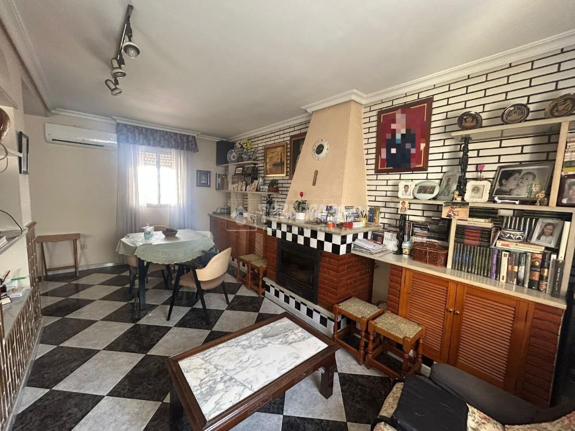 Sala d'estar de Casa adosada en venda en  Huelva Capital amb Aire condicionat i Moblat