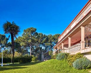 Exterior view of House or chalet for sale in Sanxenxo  with Terrace, Swimming Pool and Balcony