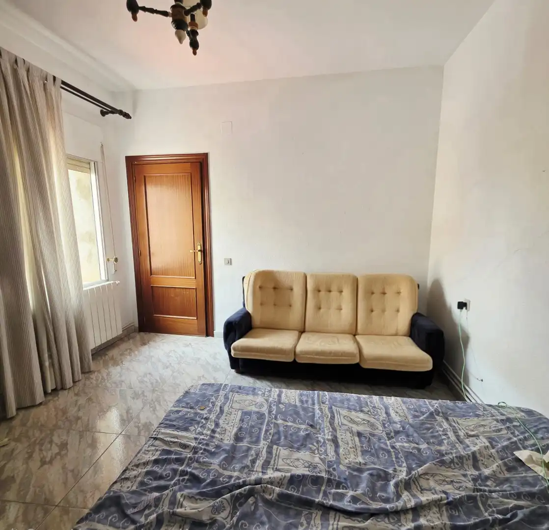 Sala d'estar de Casa adosada en venda en La Guardia amb Calefacció, Terrassa i Traster