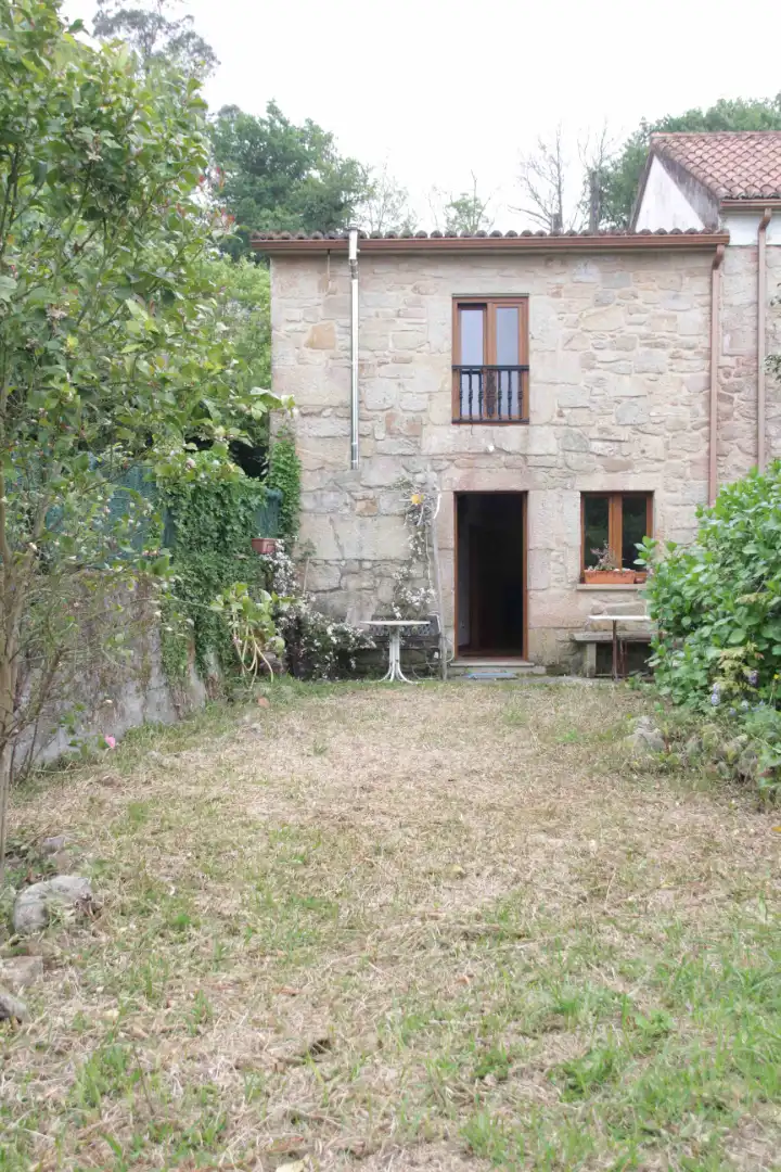 Jardí de Casa adosada en venda en Padrón amb Jardí privat, Moblat i Forn