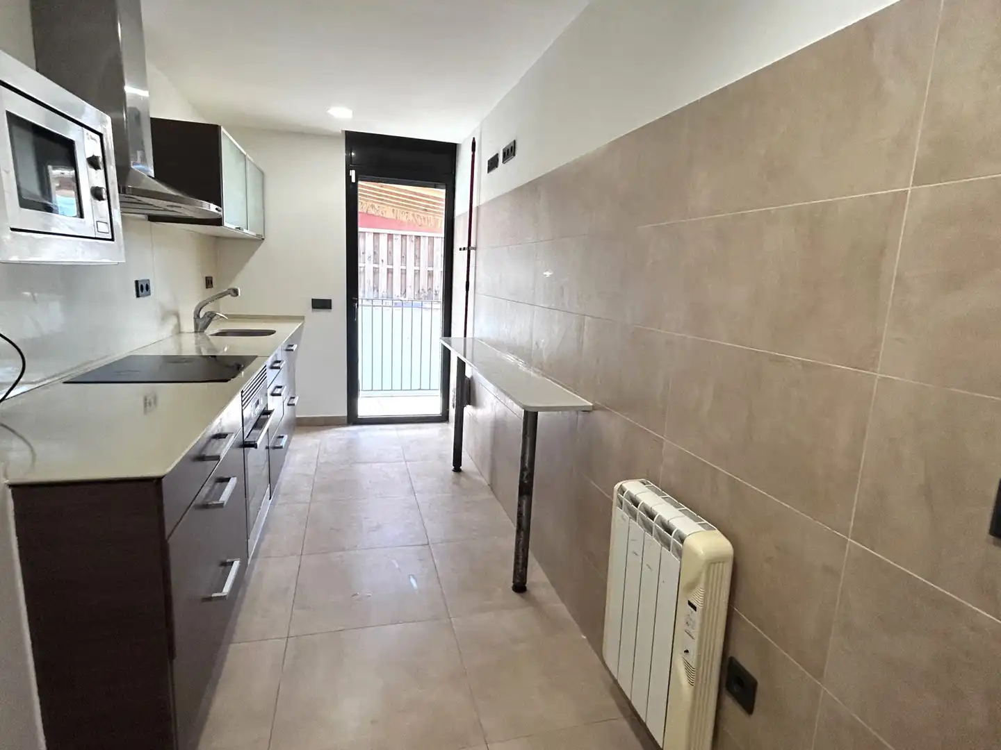 Cuina de Pis en venda en Calella amb Aire condicionat, Calefacció i Forn