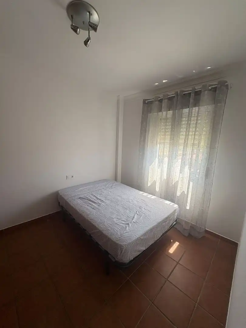 Dormitori de Casa o xalet de lloguer en Aljaraque amb Terrassa i Moblat