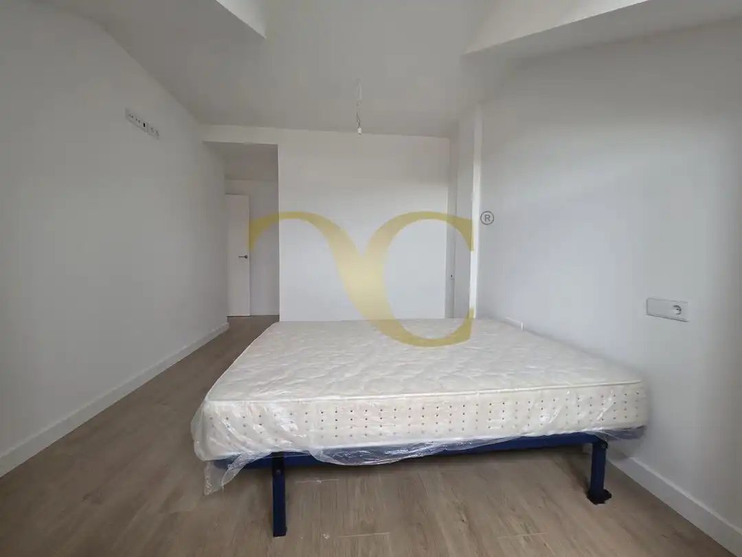 Schlafzimmer von Dachboden zum Verkauf in Llanes mit Heizung, Privatgarten und Terrasse
