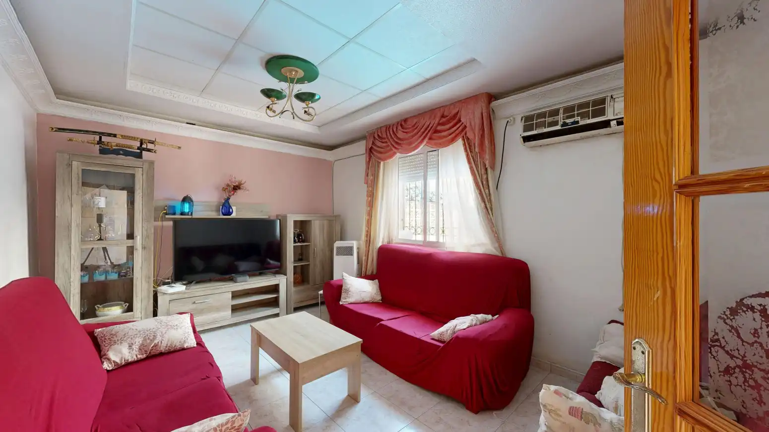 Sala d'estar de Casa adosada en venda en Cartagena amb Aire condicionat i Jardí privat
