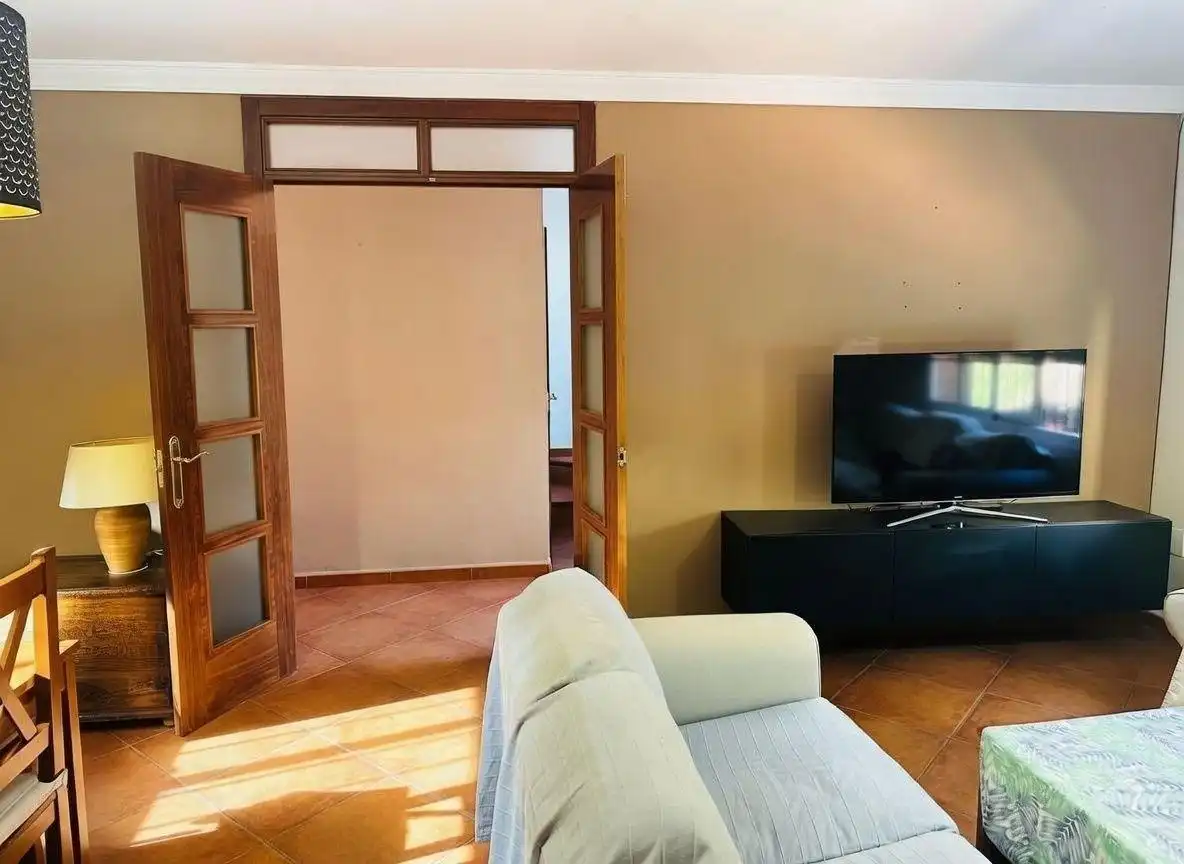 Sala de estar de Casa adosada en venta en Campo de Mijas