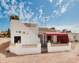 Exterior view of Single-family semi-detached for sale in Torrevieja  with Air Conditioner, Terrace and Storage room