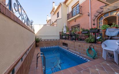 Swimming pool of House or chalet for sale in  Granada Capital  with Air Conditioner, Terrace and Swimming Pool