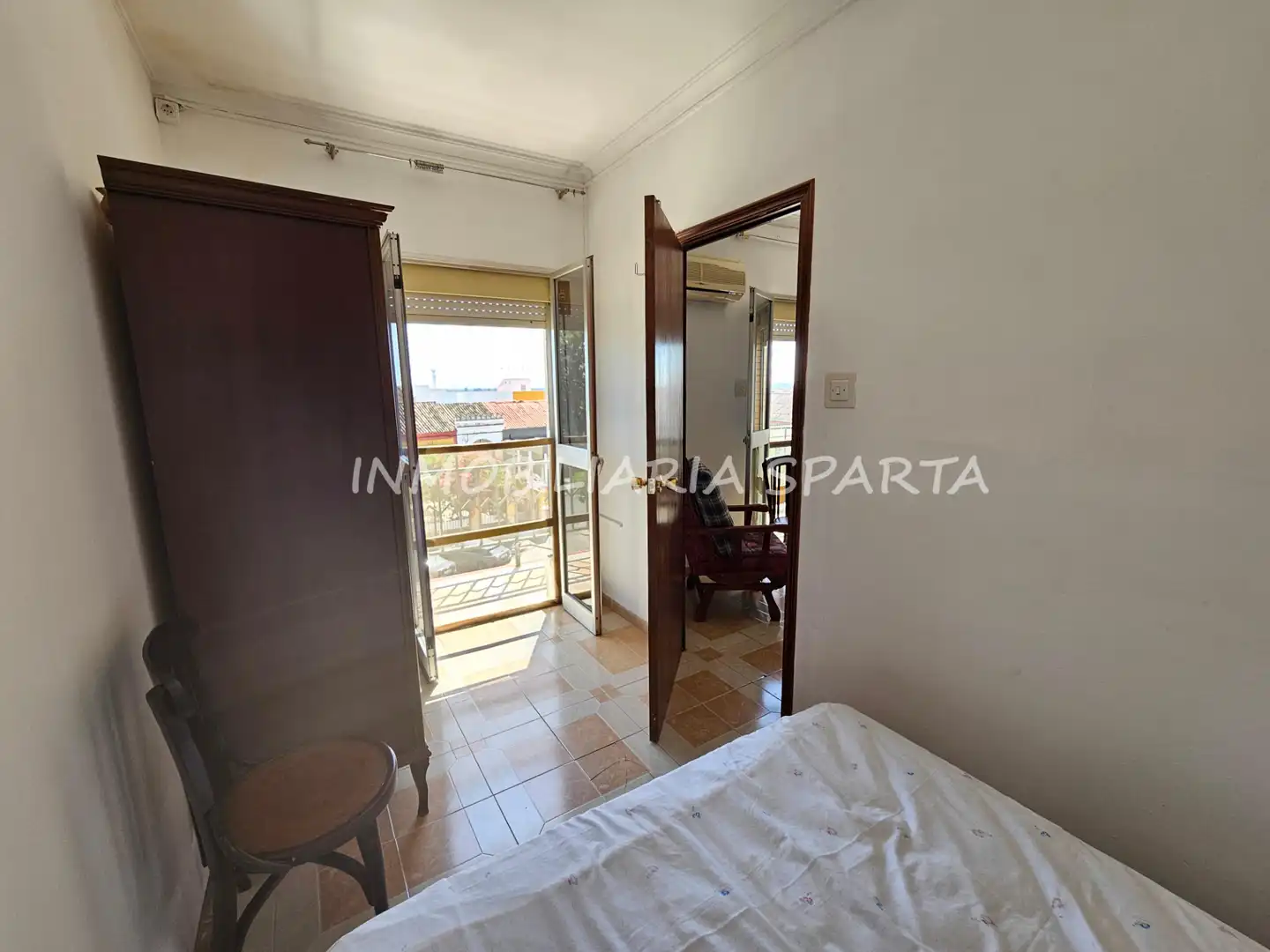 Habitación de Casa adosada en venta en Santiponce con Terraza, Trastero y Balcón