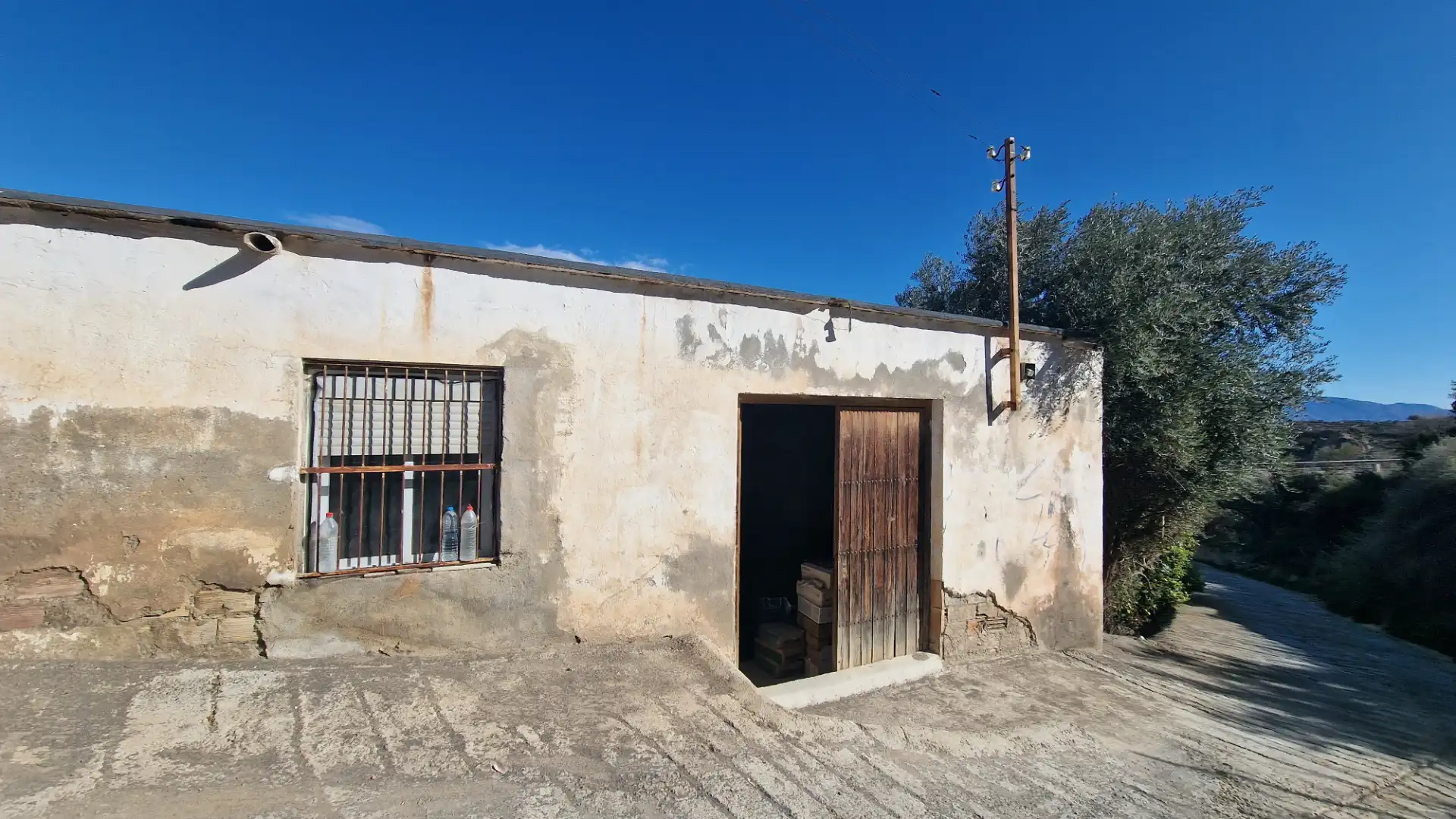 Vista exterior de Finca rústica en venda en Instinción amb Aire condicionat, Jardí privat i Traster