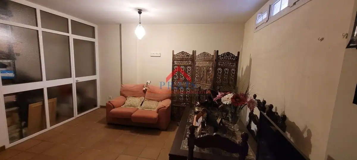Sala de estar de Casa adosada en venta en Utrera con Aire acondicionado, Trastero y Amueblado