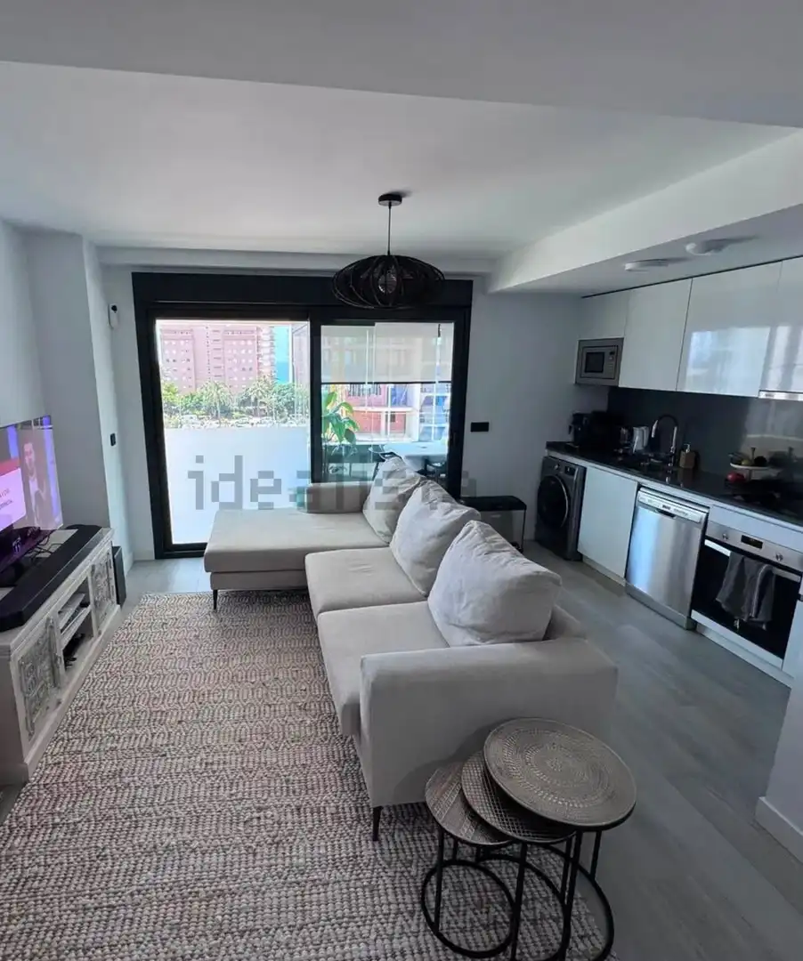 Sala d'estar de Apartament en venda en Calpe / Calp amb Aire condicionat, Calefacció i Terrassa