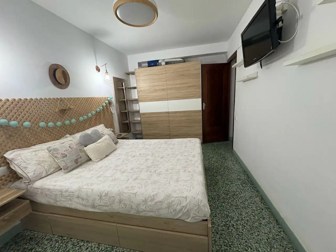 Schlafzimmer von Wohnung zum Verkauf in Cullera mit Klimaanlage, Privatgarten und Terrasse