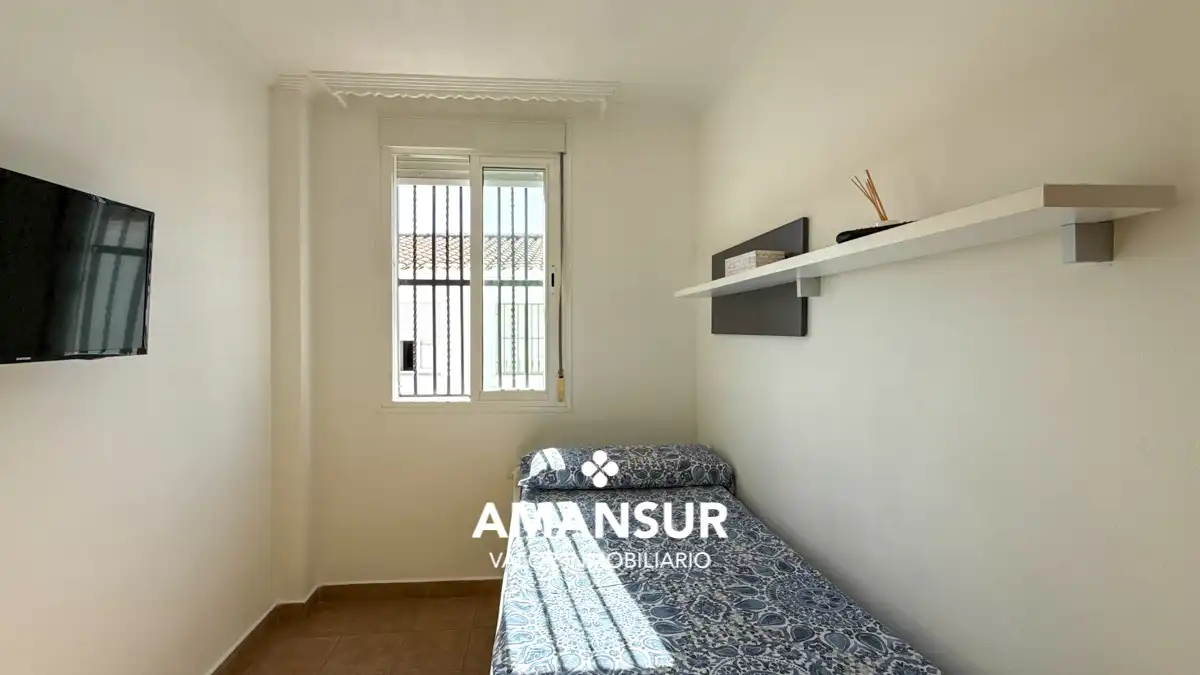 Habitación de Casa adosada en venta en Cartaya con Terraza y Alarma