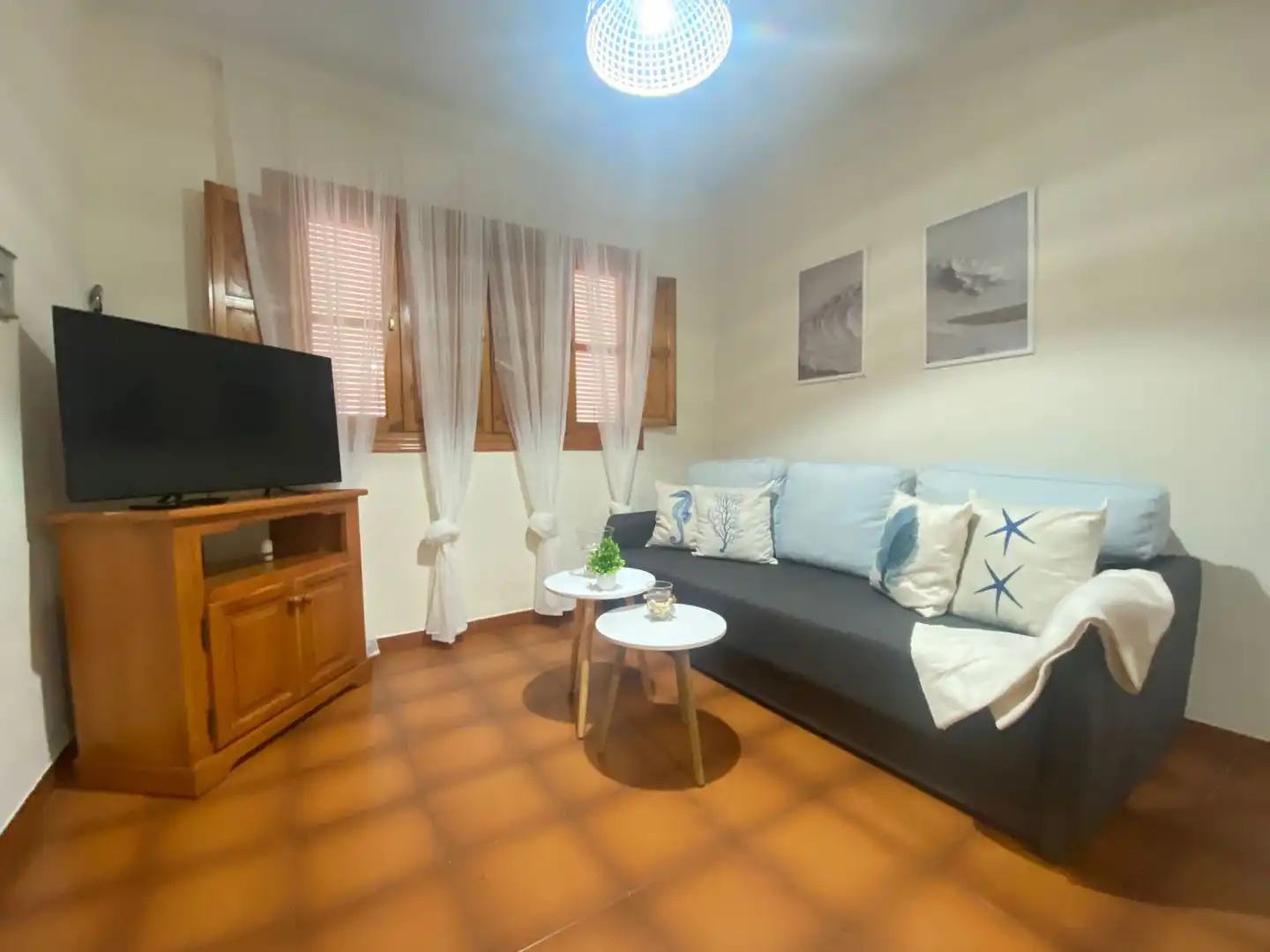 Sala de estar de Casa adosada en venta en Islantilla con Aire acondicionado y Terraza